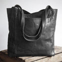 Lila Lumina Wear city handbag in chestnut brown with smart storage, versatile design, and elegant style.