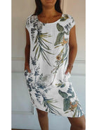 Lillian™ casual printed dress in white, featuring a relaxed fit and floral pattern, from Lumina Vancouver.