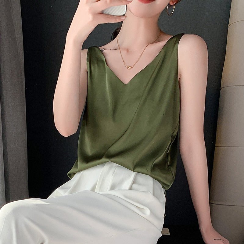 Black satin tank top by Lumina Wear featuring a relaxed fit and V-neck design, ideal for comfortable, stylish casual wear.