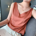 Black Lumina Wear Lily satin tank top with relaxed fit and V-neck, shown on a model, casual and stylish for everyday wear.
