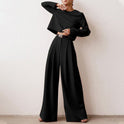 Black Lily set by Lumina Wear featuring a contemporary cropped top and wide-leg trousers, styled for modern elegance.
