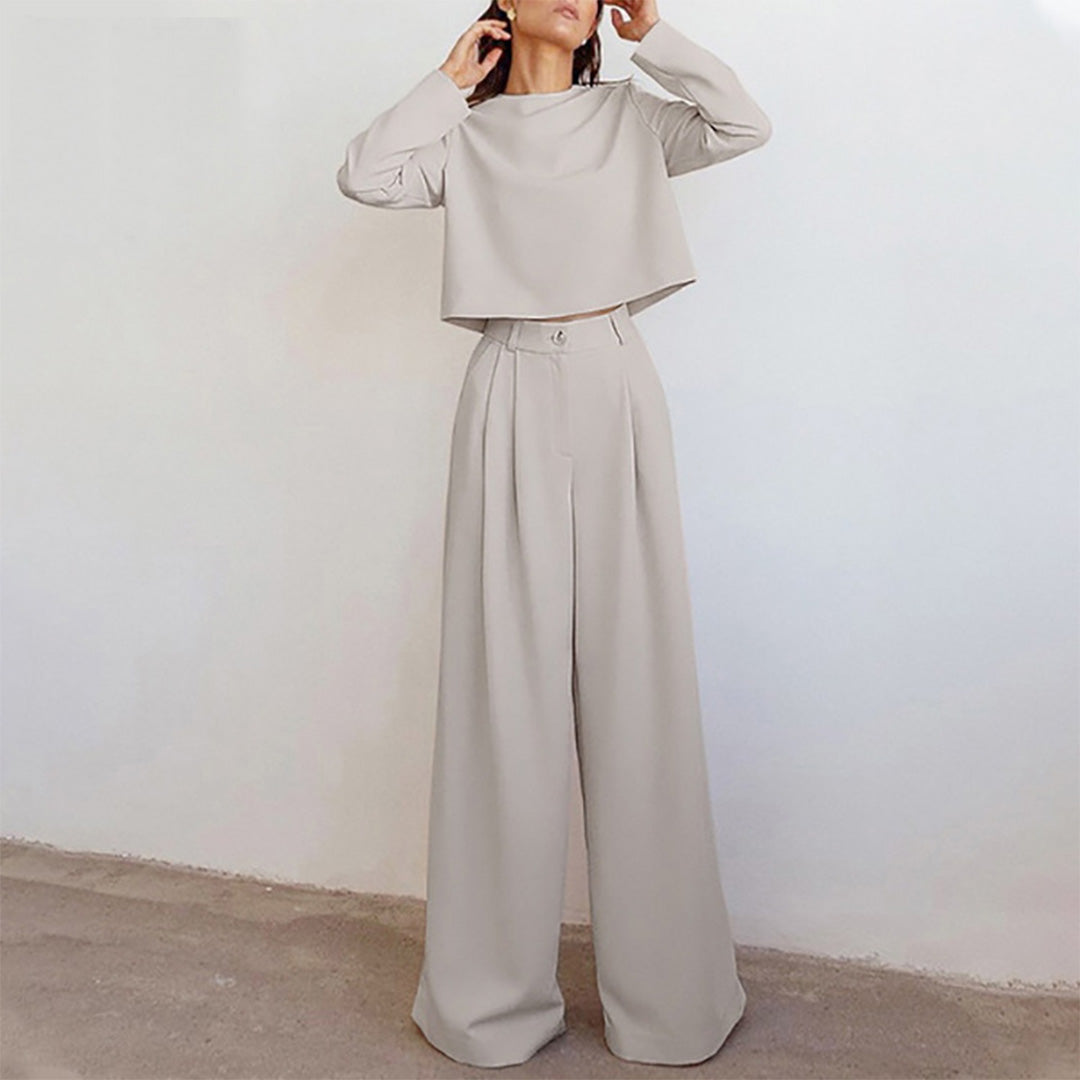 Black Lily two-piece set by Lumina Wear featuring a contemporary cropped top and wide-leg trousers.
