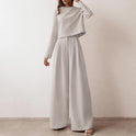 Black Lily contemporary cropped top and wide-leg trousers set by Lumina Wear, featuring a stylish two-piece outfit.