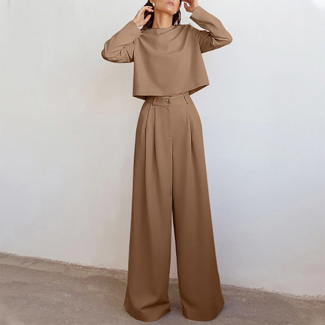 Black Lily two-piece set by Lumina Wear featuring a contemporary cropped top and wide-leg trousers.