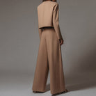 Black Lily Lumina Wear two-piece set with contemporary cropped top and wide-leg trousers, stylish and modern for casual wear.
