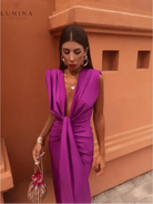 Blue Vappu elegant pleated wedding guest dress by Lumina Vancouver, featuring a chic, flowing design perfect for special occasions.