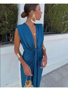Blue Vappu elegant pleated wedding guest dress by Lumina Vancouver for size 8-10, featuring a sophisticated, flowing design.