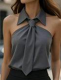 Lumina Wear Lily halter blouse with contrast design, white color, shown in size XS, featuring stylish neckline and relaxed fit.