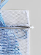 Lumina Vancouver lingerie care bag for delicate lingerie items, made of breathable mesh fabric with a secure zipper closure.