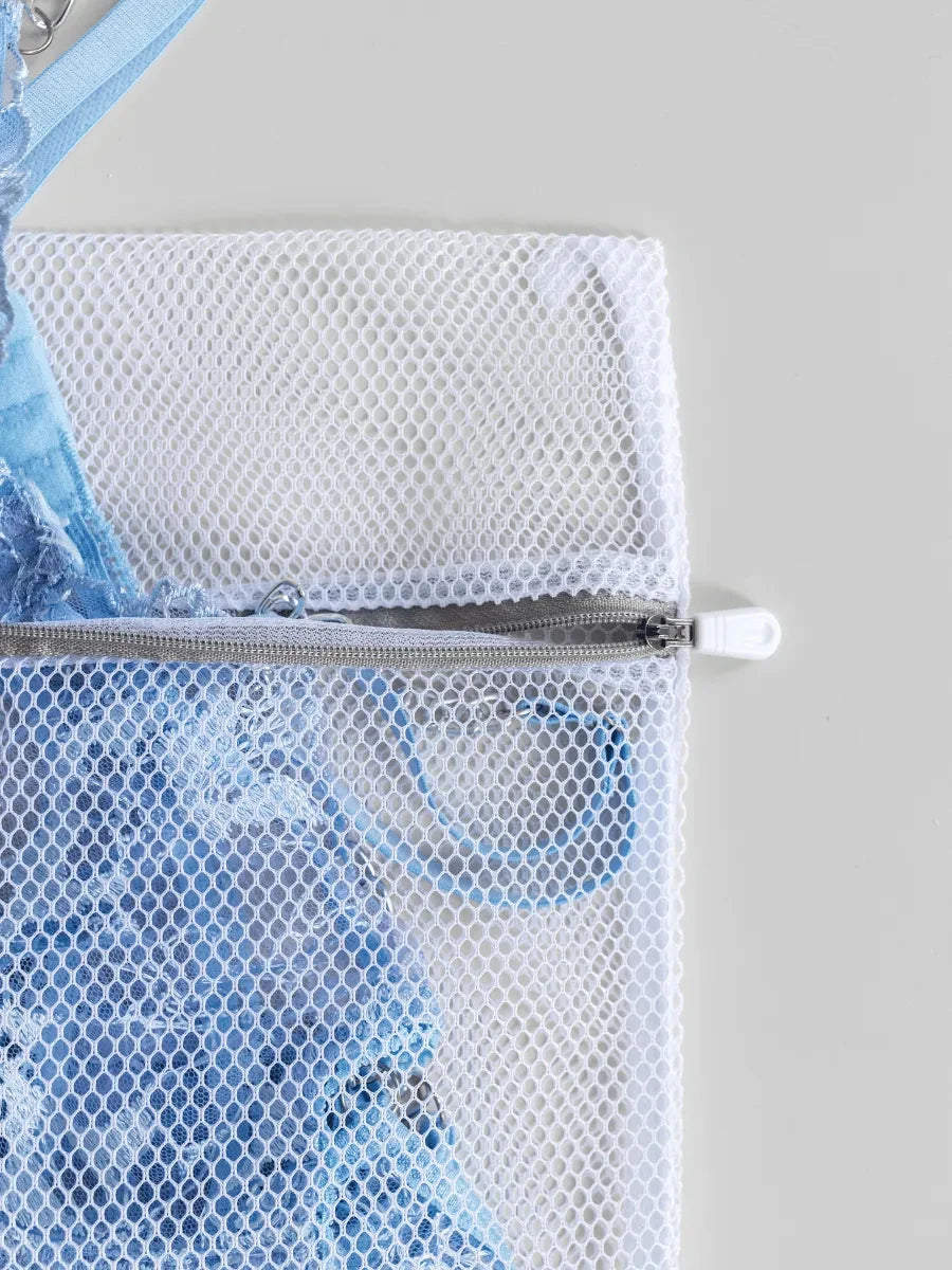 Lumina Vancouver lingerie care bag for delicate lingerie items, made of breathable mesh fabric with a secure zipper closure.
