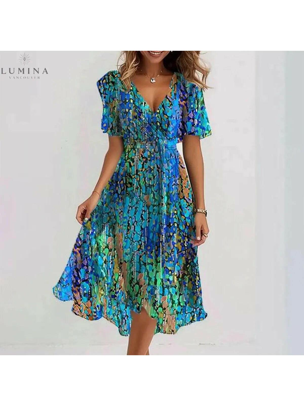 Blue Linnea Elegant Dress by Lumina Vancouver, featuring a stylish Aderhulstang design with a fitted silhouette.