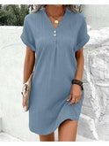 Green V-neck spring dress by Lumina Wear, featuring a flowy design, perfect for warm weather and casual or semi-formal occasions.