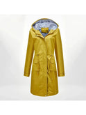 Blue Lizaya Lumina Wear elegant trenchcoat with drawstrings, stylish coat perfect for a sophisticated look