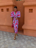 Purple Lumina Wear Loren midi dress with vibrant puff sleeves, stylish and flowing, perfect for elegant occasions.