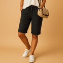 Light blue Capri pants with drawstring from Lumina Wear, relaxed fit, casual style, shown on a model.