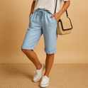 Light blue Capri pants with drawstring from Lumina Wear, relaxed fit, casual style, shown on a model.