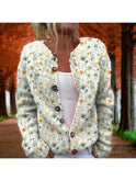 Lowri flower print cardigan by Lumina Wear, lightweight with colorful floral pattern, shown on a model.