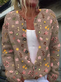 Lowri flower print cardigan by Lumina Wear, featuring colorful floral patterns on lightweight knit fabric.