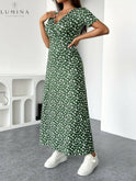 Green floral knit peplum dress by Lumina Wear, elegant design with fitted waist and feminine silhouette, XS size.