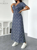 Green floral knit dress by Lumina Wear featuring peplum style, perfect for elegant occasions.