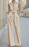 Orange sleeveless jumpsuit from Lumina Wear's Lucienne collection, featuring a stylish, fitted design perfect for casual or dressy occasions.