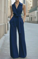 Orange Lucienne sleeveless jumpsuit by Lumina Wear, featuring a fitted design and stylish wide-leg silhouette.