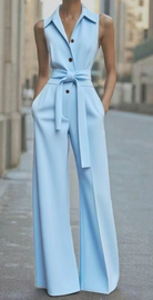 Orange sleeveless jumpsuit by Lumina Vancouver, featuring a fitted design and stylish wide-leg silhouette.