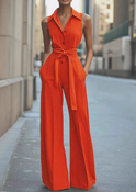 Orange sleeveless jumpsuit by Lumina Wear, style Lucienne, shown on a model with a relaxed fit and modern design.