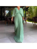 Blue Lucy wedding guest dress by Lumina Wear, elegant sleeveless design with flowing fabric for special occasions.