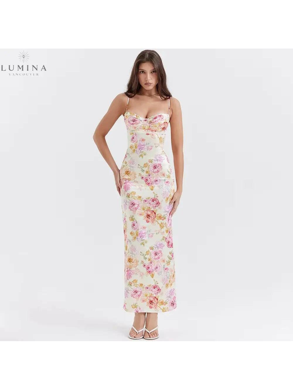 Lucy floral satin maxi dress by Lumina Vancouver, sleeveless design with a flowy, elegant floral pattern on smooth satin fabric.
