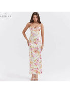 Lucy floral satin maxi dress by Lumina Vancouver, sleeveless design with a flowy, elegant floral pattern on smooth satin fabric.
