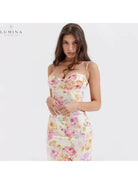 Lucy floral satin maxi dress by Lumina Vancouver, showing the elegant floral pattern and flowing satin fabric in a full-length view.