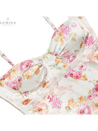 Lucy floral satin maxi dress by Lumina Vancouver, showcasing a flowy satin fabric with a floral pattern and elegant design.