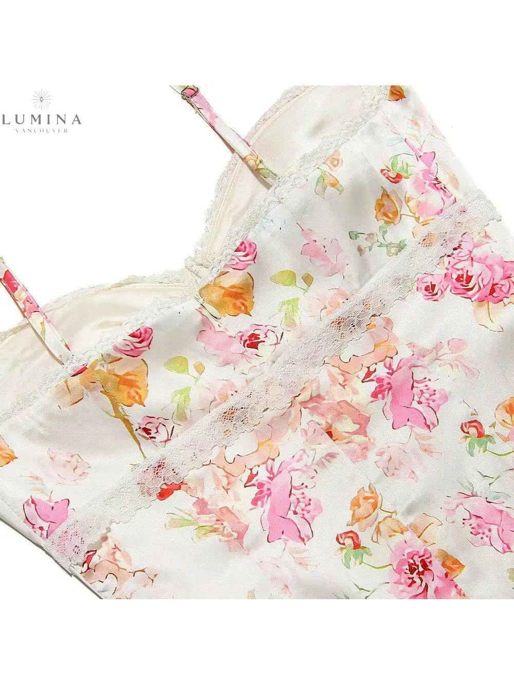 Lucy floral satin maxi dress by Lumina Vancouver, shown in XS size with elegant floral pattern and flowing satin fabric.