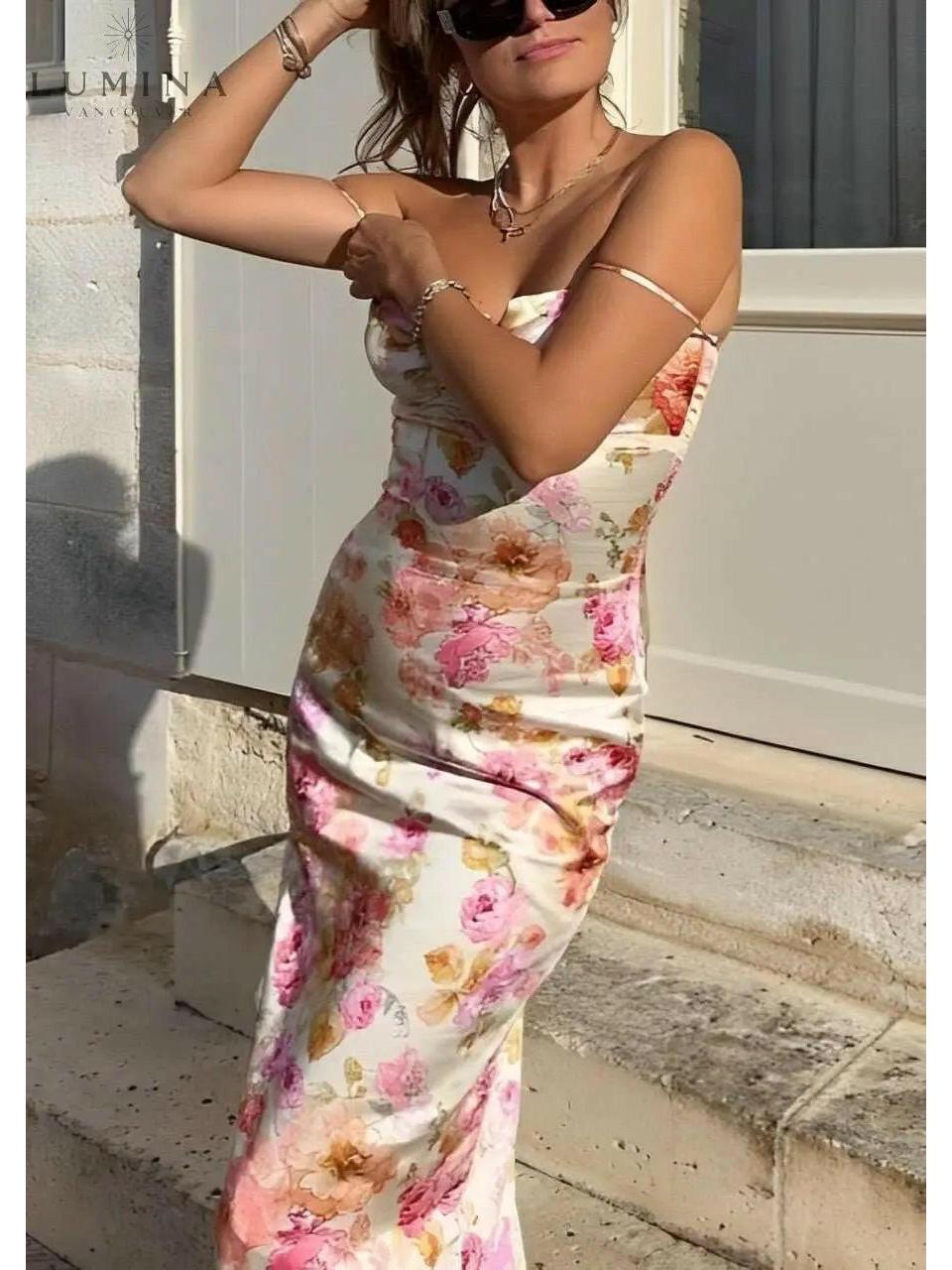 Lucy floral satin maxi dress by Lumina Vancouver, showcasing a flowy satin fabric with a floral pattern and elegant maxi length.