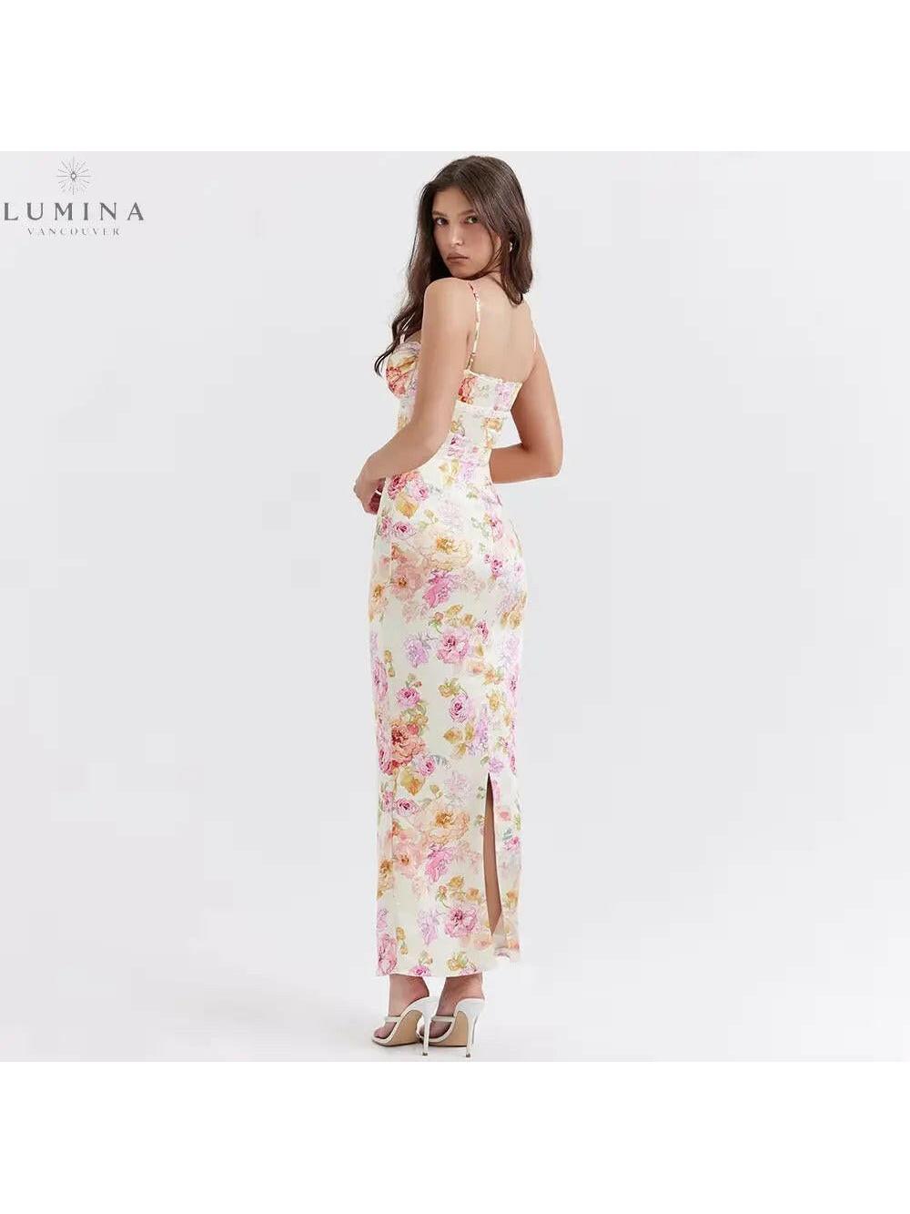 Lucy floral satin maxi dress by Lumina Vancouver, featuring a flowing design and intricate floral pattern in soft satin fabric.
