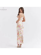 Lucy floral satin maxi dress by Lumina Vancouver, featuring a flowing design and intricate floral pattern in soft satin fabric.