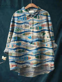 Lumina Wear Dana Fish Print T-Shirt featuring a colorful fish design on soft cotton fabric.