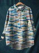 Dana Fish Print Tee by Lumina Vancouver, featuring a vibrant fish graphic on a casual short-sleeve cotton t-shirt.