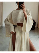 Green Laure Two-Piece Set by Lumina Vancouver featuring a stylish top and matching pants on a model.