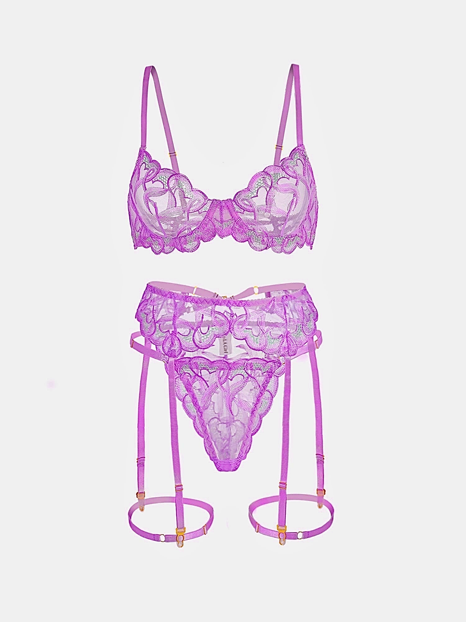 Purple embroidery lingerie set with three pieces, featuring delicate lace and satin details from Lumina Vancouver.