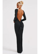 Lumina Vancouver Evanna boat-neck backless maxi dress in XS, flowing fabric, elegant design, worn by a model showcasing style.