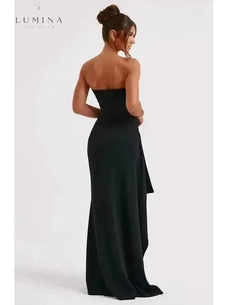 Black Ailiana Radiance Split Dress by Lumina Vancouver, showcasing elegant design and flowing fabric on a model.