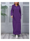 Black Lumina Wear Elisa hooded dress with long sleeves and a relaxed fit, shown on a mannequin.