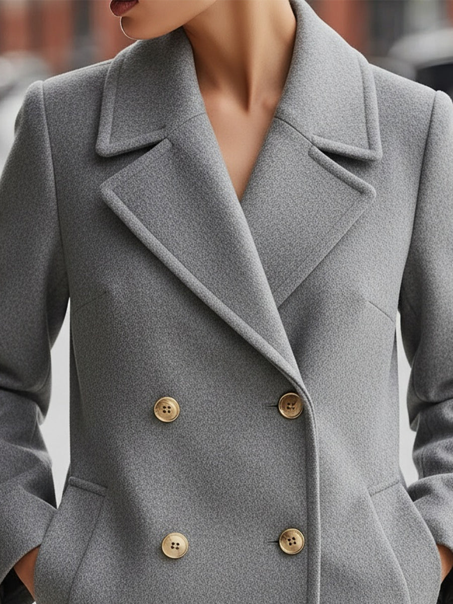 Grey Lumina Wear double-breasted wool blend blazer, tailored fit, featuring notched lapels and button closure, on a mannequin.
