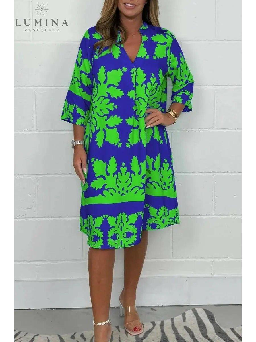 Bergljot Spring Dress by Lumina Vancouver in blue and army green, featuring a flowing design and lightweight fabric.
