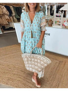 Lumina Vancouver Estrella casual half-sleeve maxi dress in blue, flowing fabric with a relaxed fit and elegant neckline.