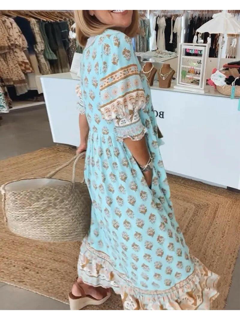 Lumina Vancouver Estrella casual half-sleeve maxi dress in blue, flowing fabric with a relaxed fit and elegant design.