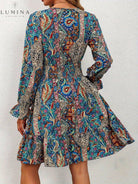 Blue Boho Elegance Dress by Lumina Vancouver featuring flowing fabric and intricate embroidery, perfect for stylish occasions.