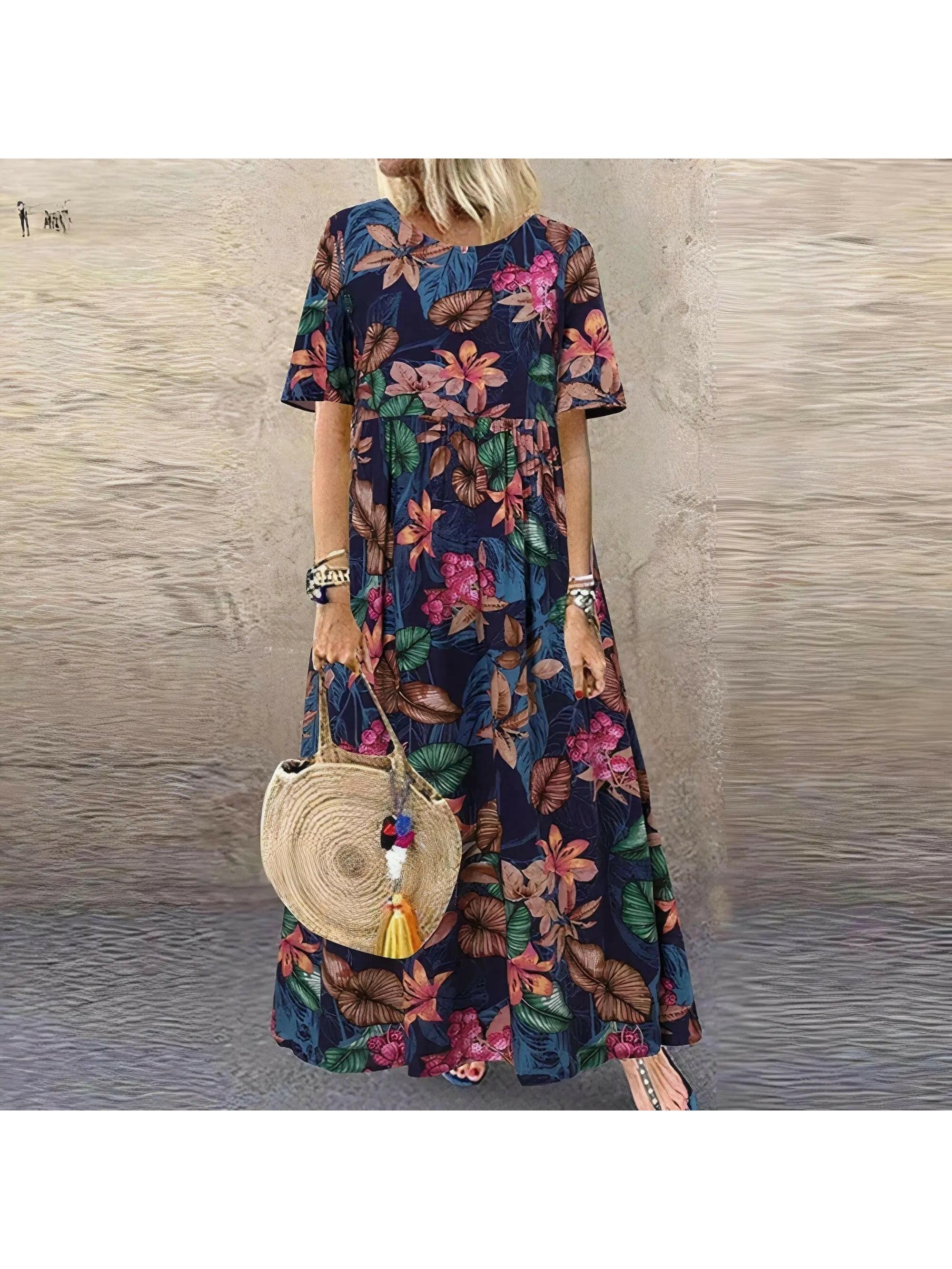 Blue Loewe floral summer dress by Lumina Vancouver, elegant and comfortable for warm-weather occasions.